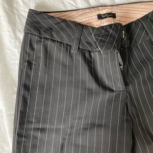 Very lightly worn flare work pants. Black with thin white stripes, size 4.